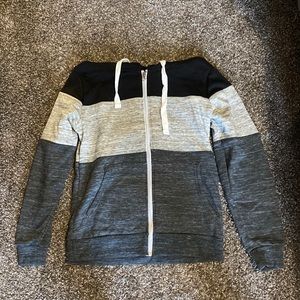 Black and grey stripped zip up hoodie, size small. Never worn.